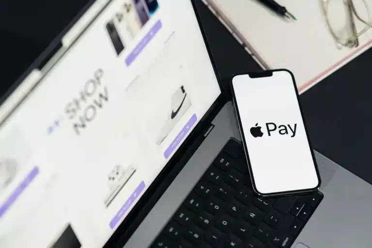 Smartphone showing app store interface with payment options and commission structure