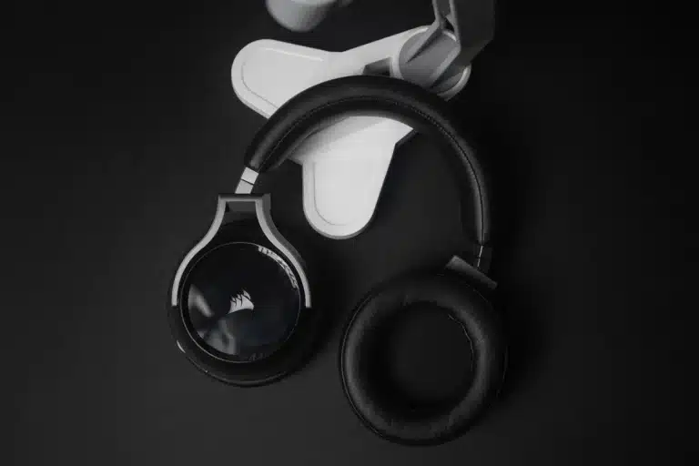 Close-up of someone wearing comfortable over-ear headphones with rounded design and cushioned ear pads