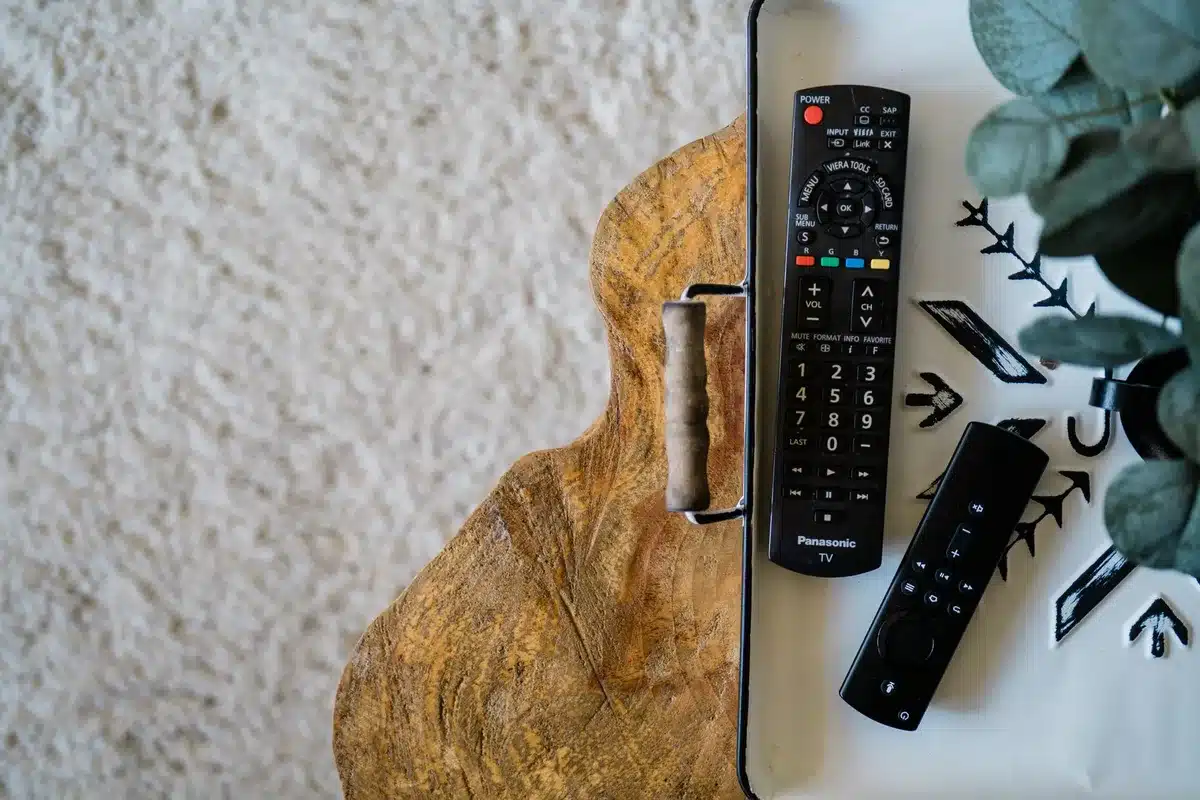 A modern remote control on a clean tech background, representing next-generation device innovation