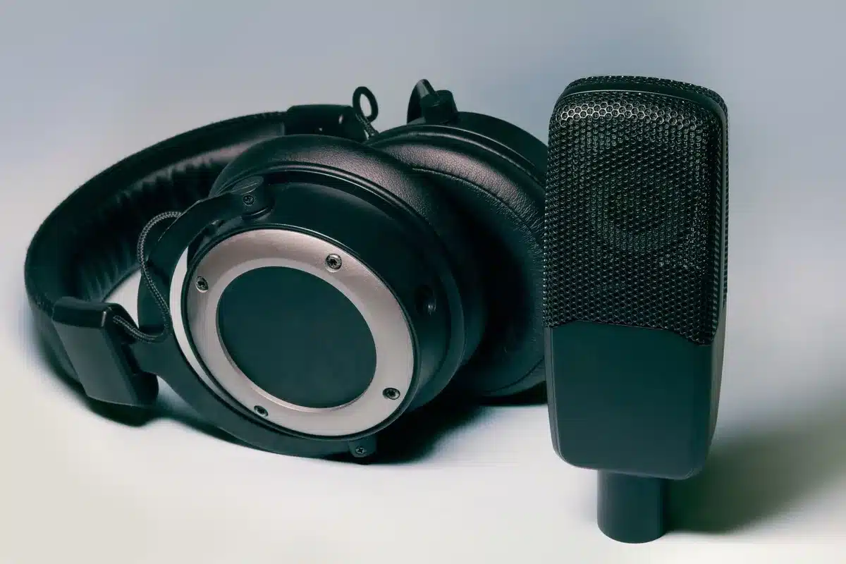 Premium over-ear headphones with brushed aluminum shells and soft memory foam ear cups on a neutral surface