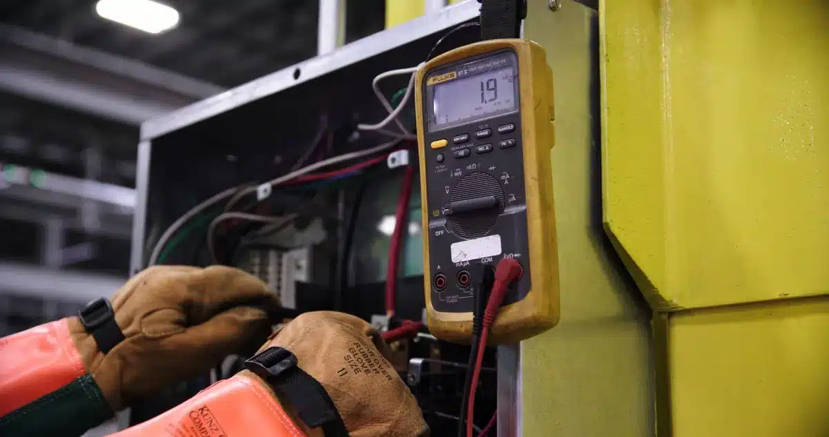 Close-up of an electric motor component showing technical specifications and power rating