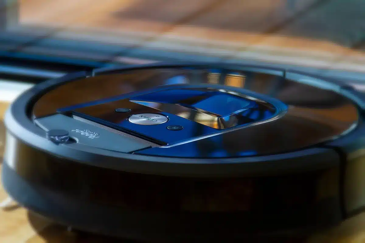 Sleek robotic vacuum with integrated LiDAR showing its low 9.4 cm height