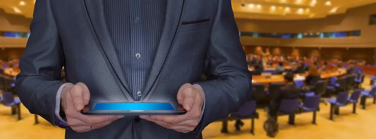 11-inch tablet displaying a movie with stereo speakers visible