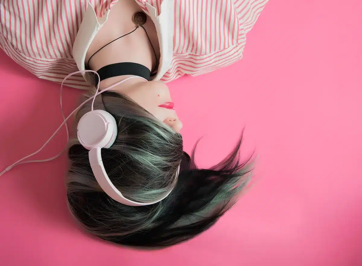 Young shoppers browsing affordable headphones on a store display