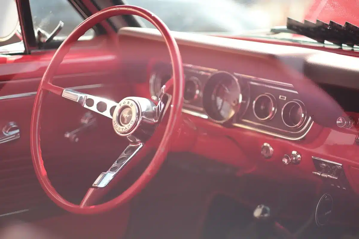 Dynamic side silhouette showing sloping roofline of a coupe-like car