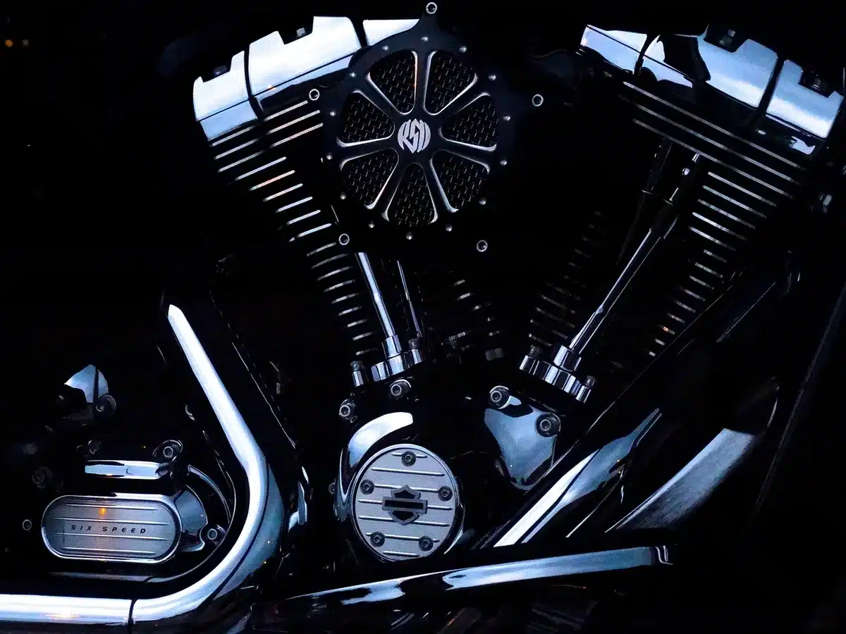 Close-up of an electric motor and differential components under the hood
