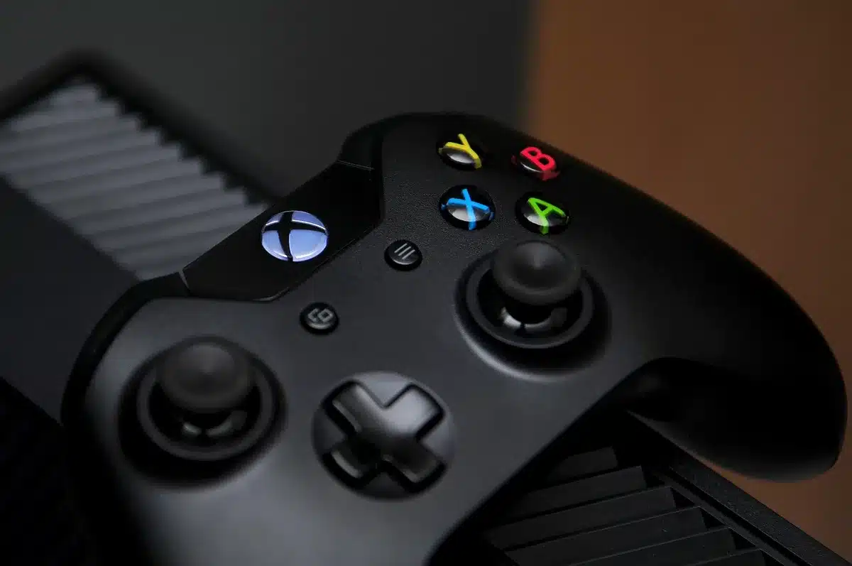 Close-up of a matte-black controller showing textured rear grip